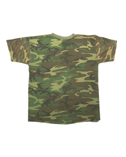 Camouflage-patterned t-shirt on a white background