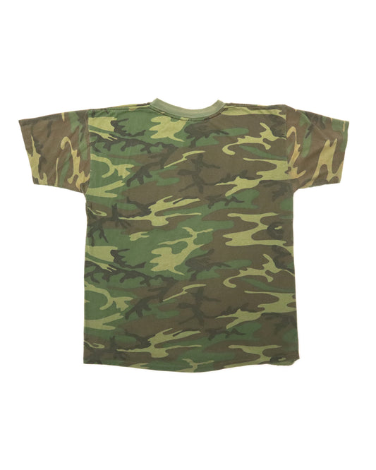 Camouflage-patterned t-shirt on a white background