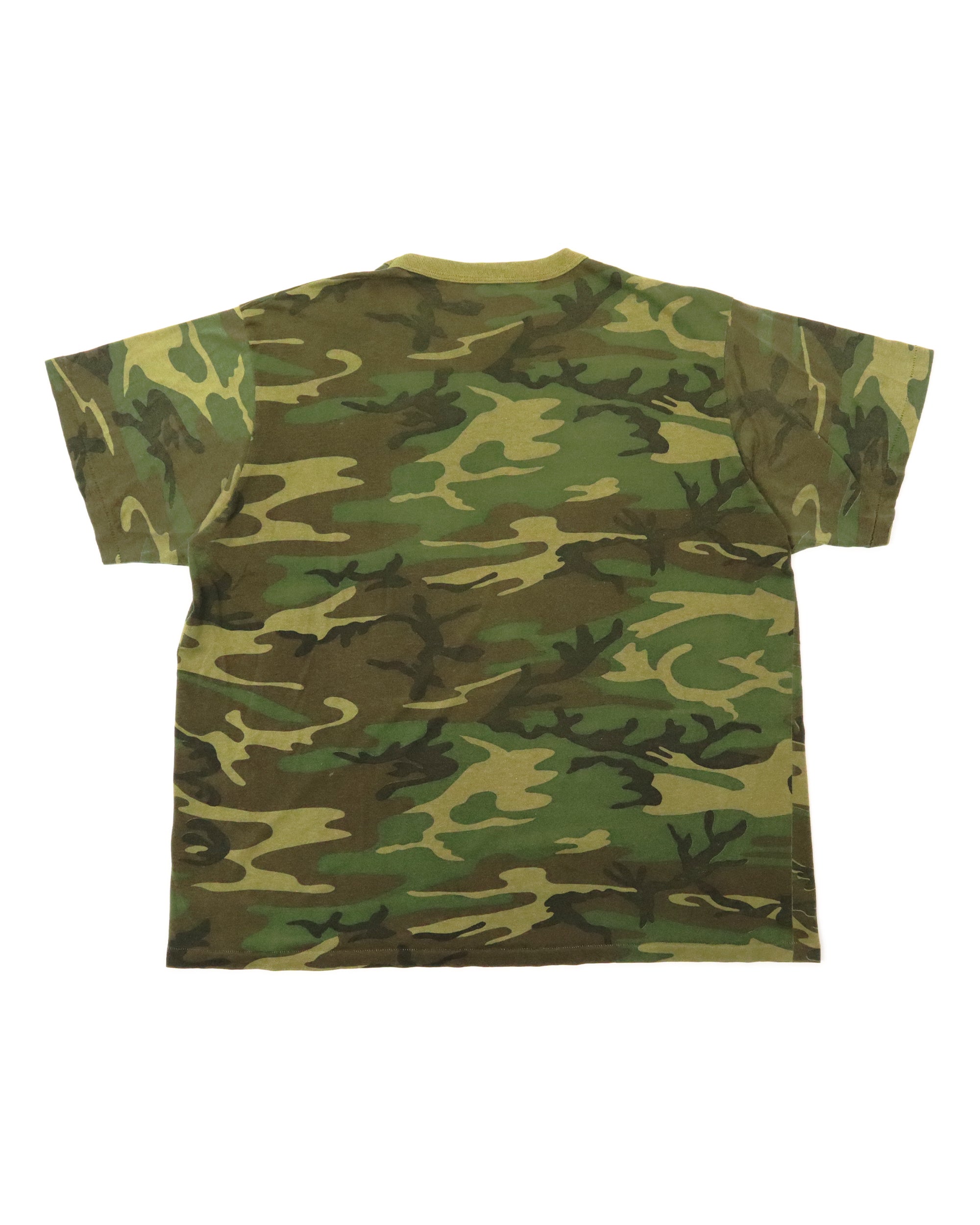 Camouflage-patterned t-shirt on a white background