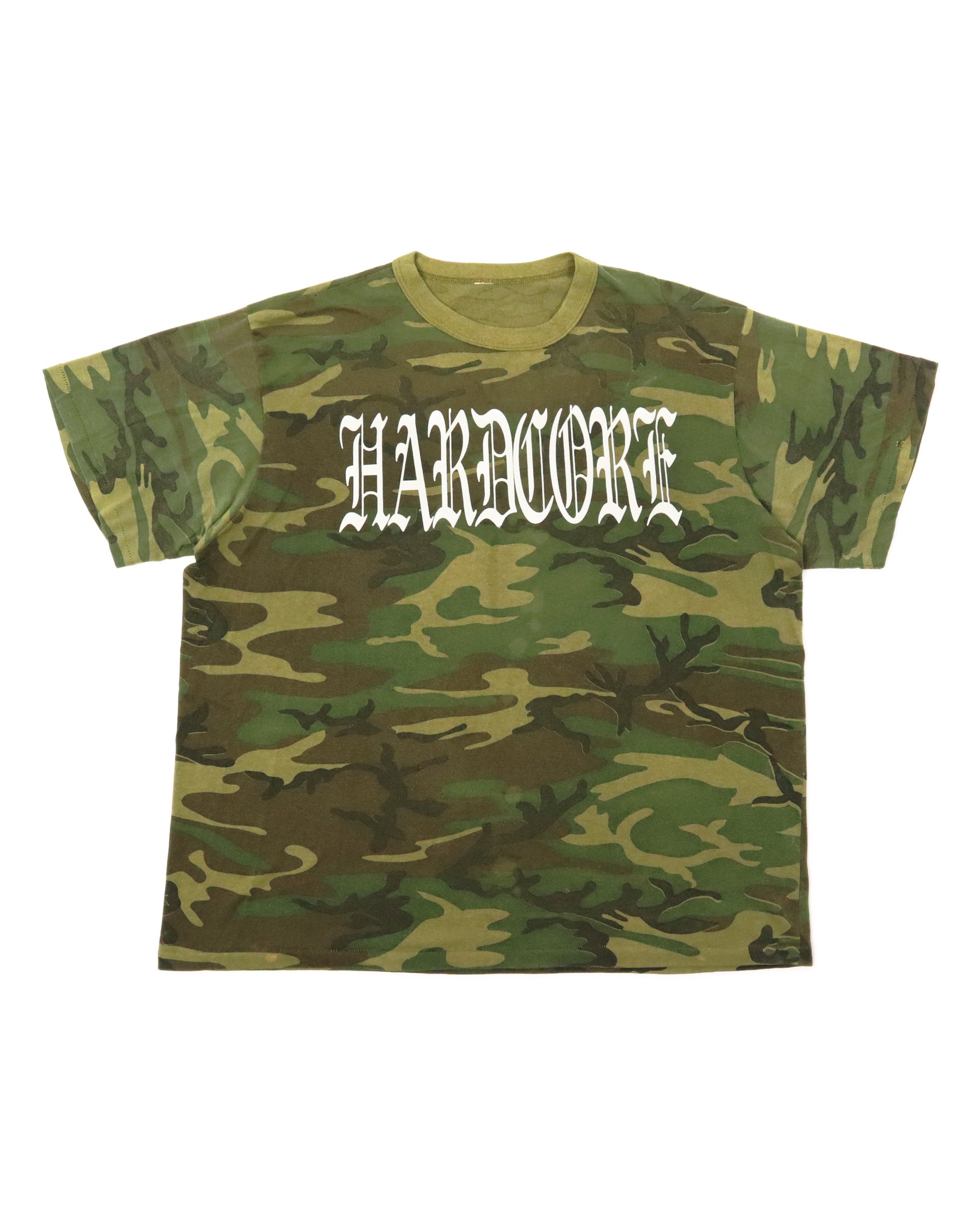 Camouflage t-shirt with 'HARDCORE' text on a white background