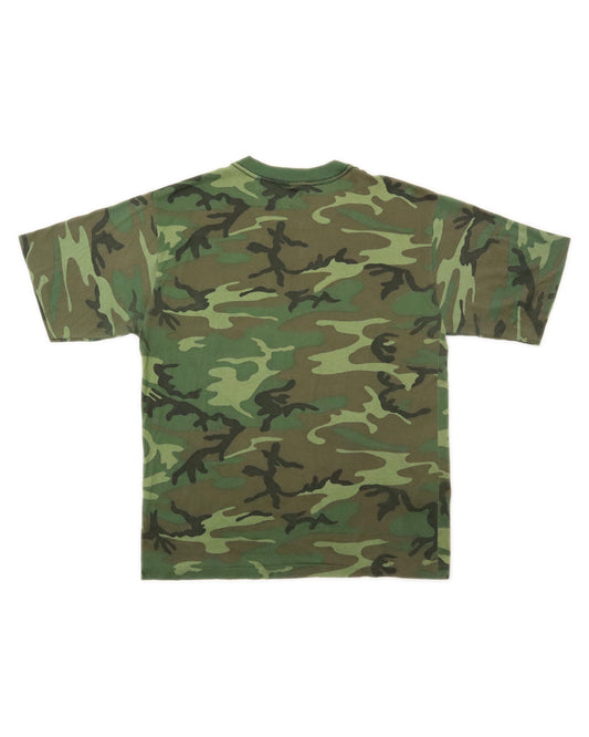 Camouflage-patterned t-shirt on a white background
