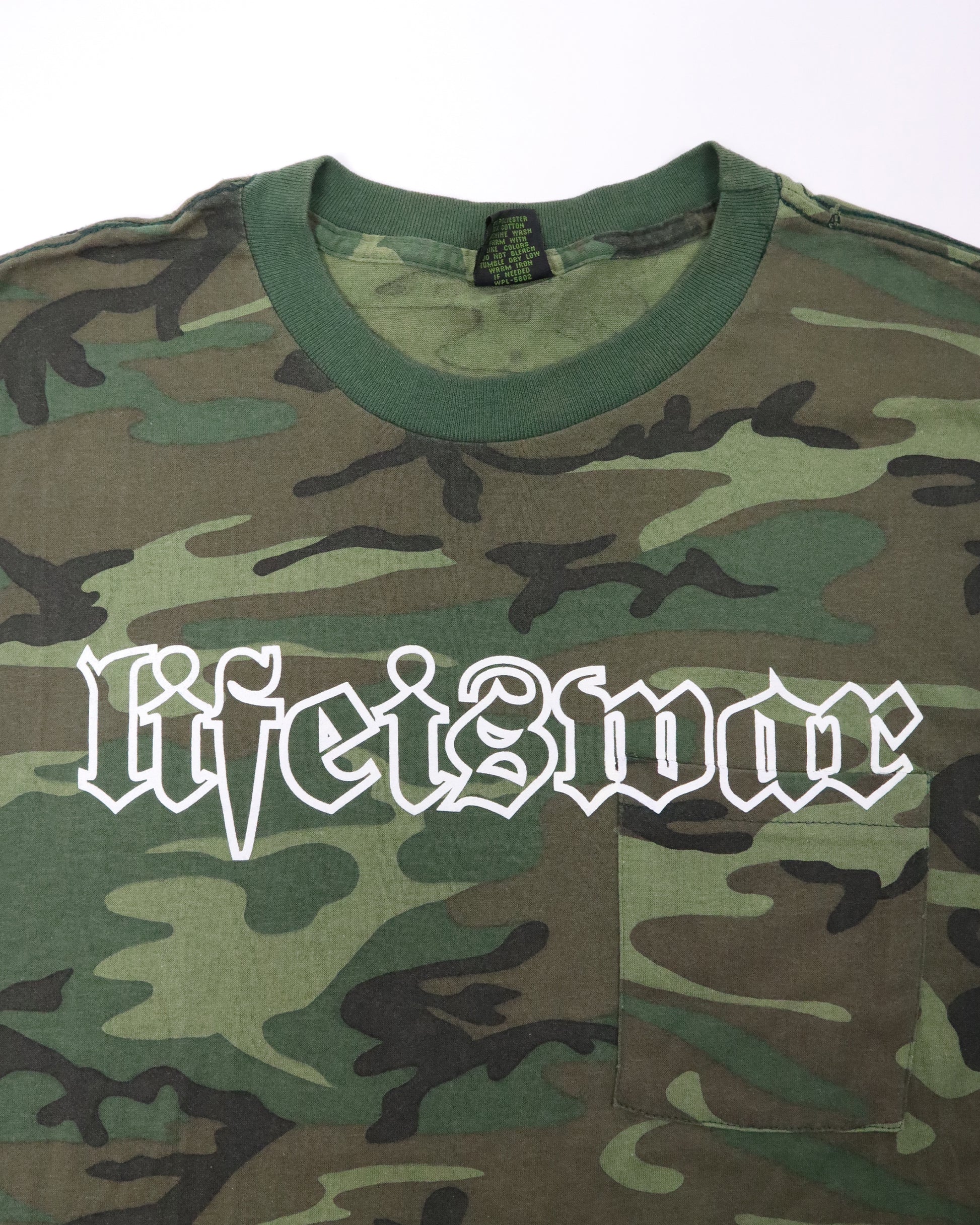 Camouflage t-shirt with 'Life is War' text on a white background