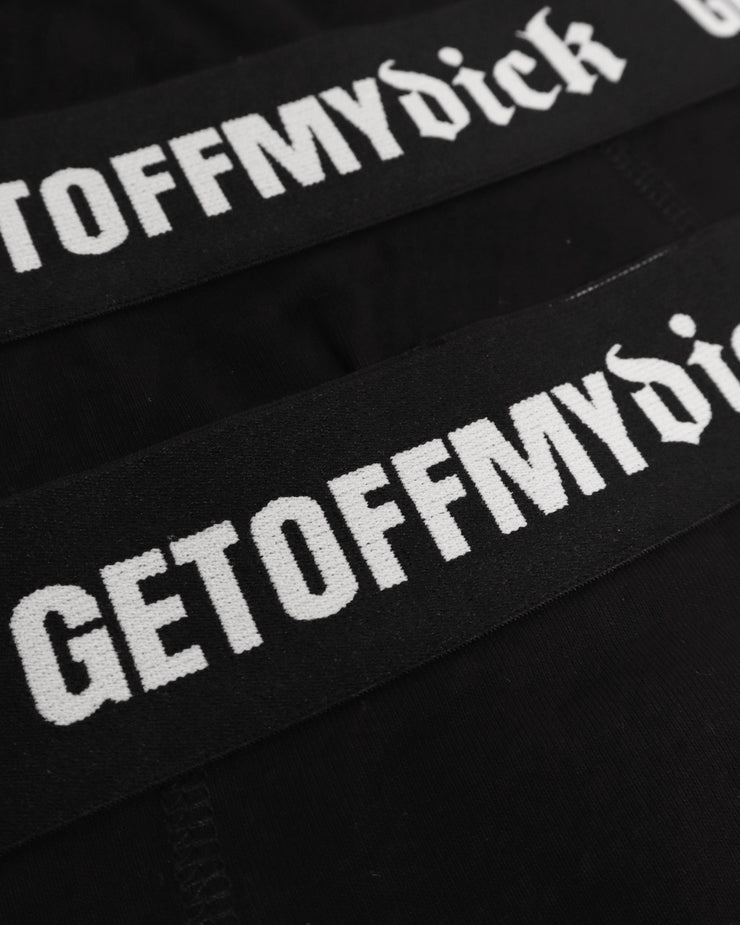 Black headbands with 'GETOFFMYDICK' text on a black background