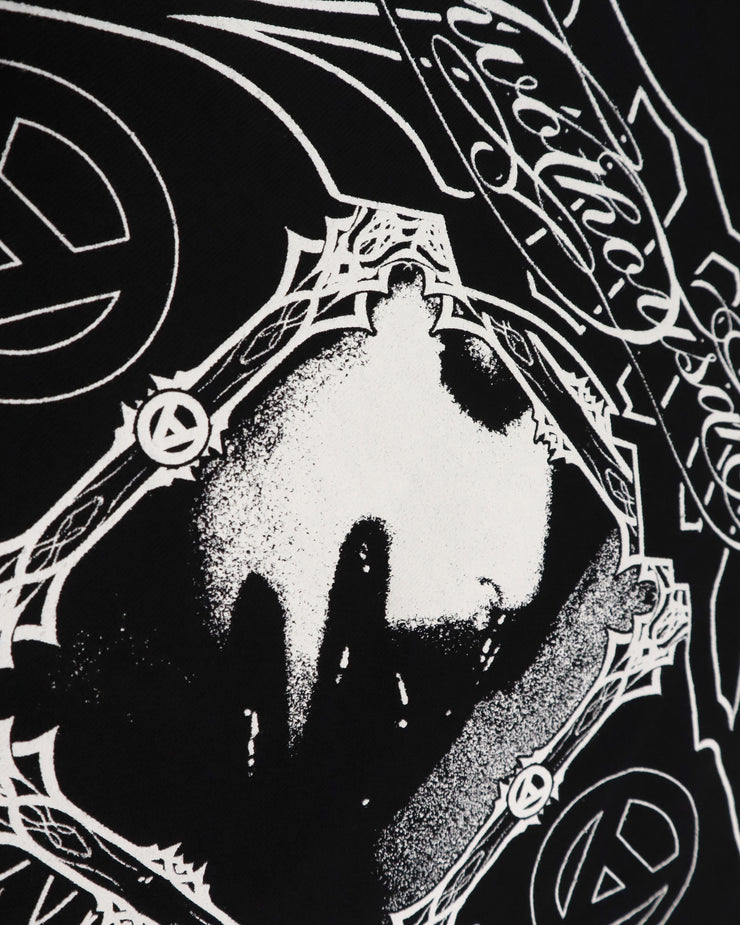Black and white illustration with intricate patterns and symbols