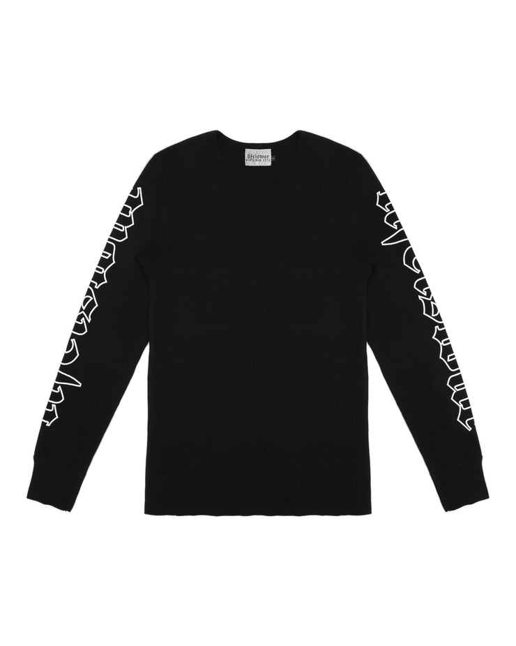 Black long-sleeve shirt with white geometric patterns on sleeves against a white background
