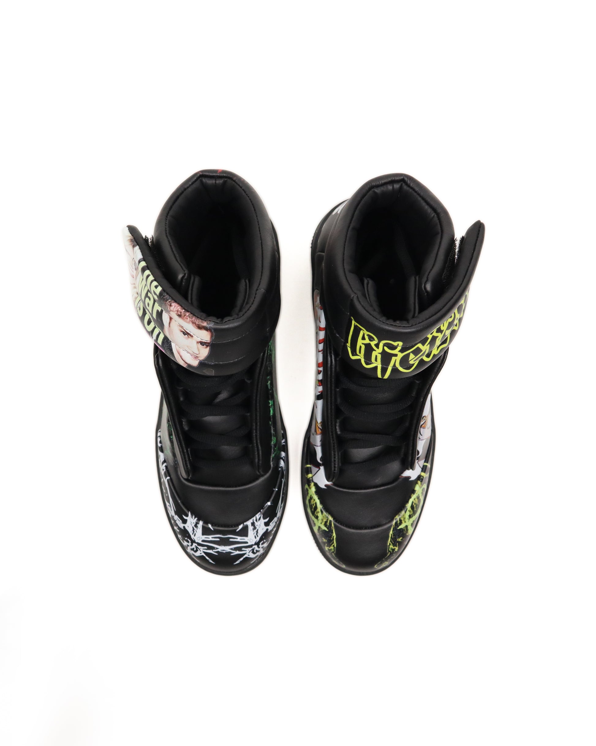 Pair of black high-top sneakers with colorful designs on a white background